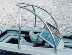 White & black boat with two seats and a Monster Tower in the middle of the water.